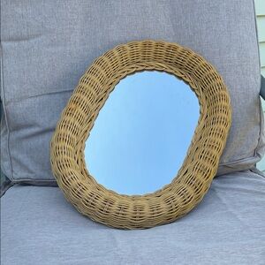 Oval wicker mirror